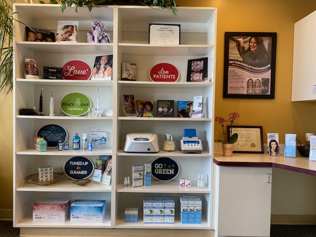 Shelves with various items in dental office