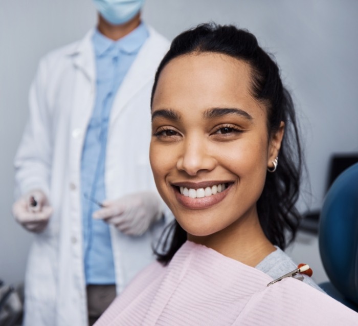 Female dental patient smiling during visit to preventive dentist in San Jose