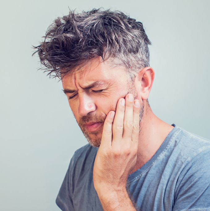 Patient experiencing toothache